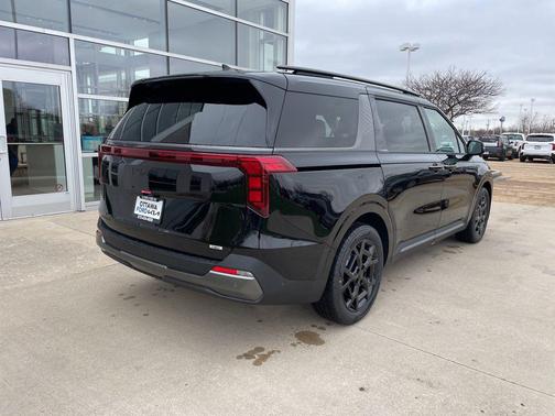 Aurora Black Pearl 2026 Kia Carnival Hybrid SX