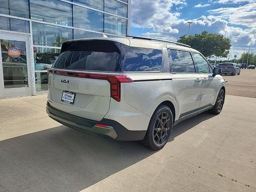 Ivory Silver 2026 Kia Carnival SX