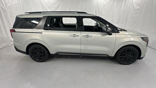 Ivory Silver 2026 Kia Carnival SX