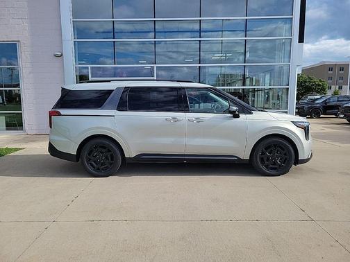 Ivory Silver 2026 Kia Carnival SX