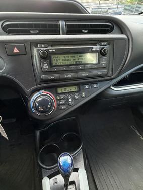 Orange Metallic 2014 Toyota Prius c Four
