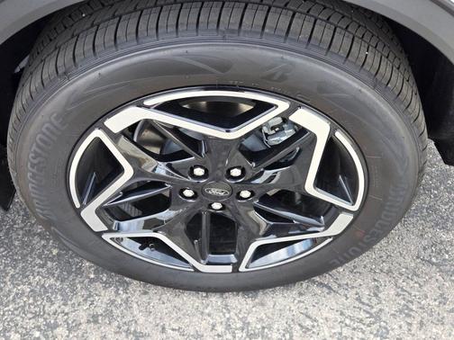 space silver metallic 2026 Ford Escape Platinum