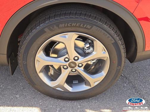 rapid red metallic tinted clearcoat 2026 Ford Escape ST-Line