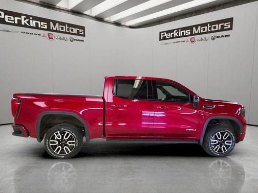Volcanic Red 2025 GMC Sierra 1500 AT4