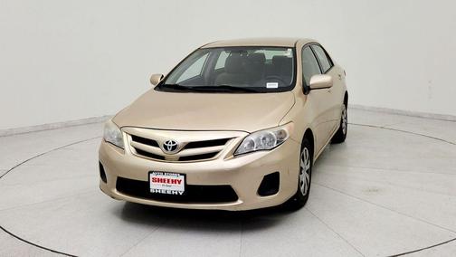 Sandy Beach Metal 2011 Toyota Corolla LE