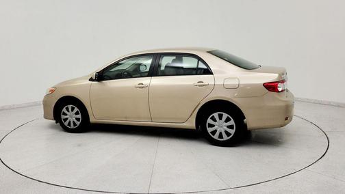 Sandy Beach Metal 2011 Toyota Corolla LE