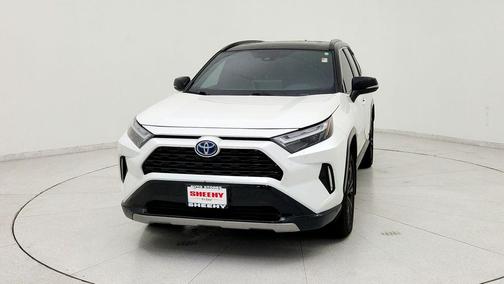 Wind Chill Pearl/Midnight Black Metallic 2024 Toyota RAV4 Hybrid SE