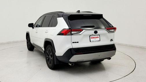 Wind Chill Pearl/Midnight Black Metallic 2024 Toyota RAV4 Hybrid SE