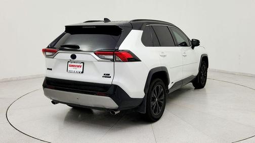 Wind Chill Pearl/Midnight Black Metallic 2024 Toyota RAV4 Hybrid SE