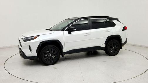 Wind Chill Pearl/Midnight Black Metallic 2024 Toyota RAV4 Hybrid SE