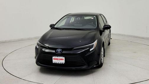 Midnight Black Metallic 2025 Toyota Corolla Hybrid LE