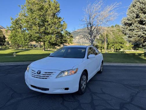 Super White 2009 Toyota Camry LE