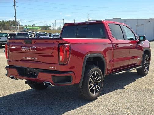 Volcanic Red 2025 GMC Sierra 1500 AT4