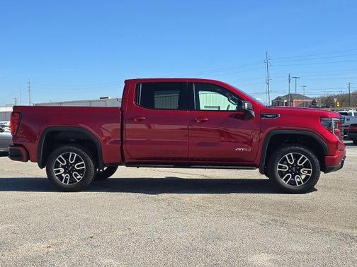 Volcanic Red 2025 GMC Sierra 1500 AT4