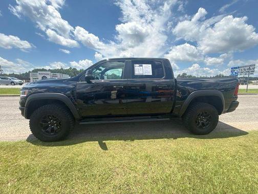 Diamond Black Crystal Pearlcoat 2026 RAM 1500 RHO Crew Cab 4x4 5'7' Box