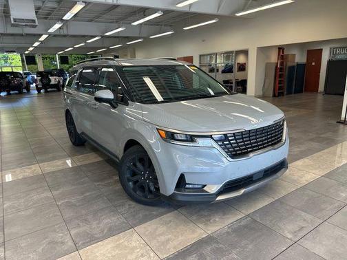 Ceramic Silver 2024 Kia Carnival SX