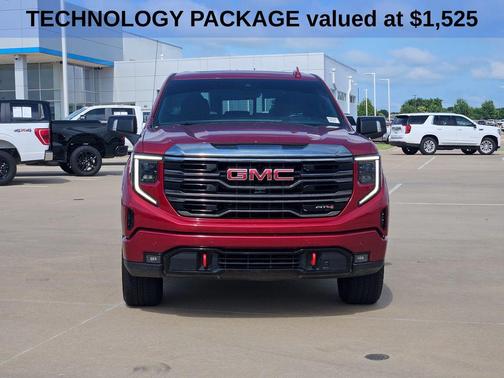 Volcanic Red Tintcoat 2024 GMC Sierra 1500 AT4
