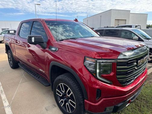 Volcanic Red Tintcoat 2024 GMC Sierra 1500 AT4