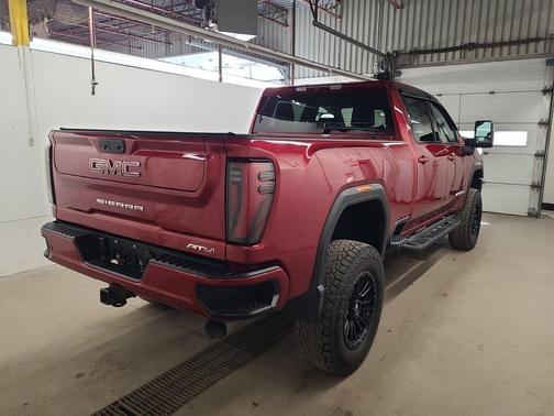 Volcanic Red 2024 GMC Sierra 2500 AT4