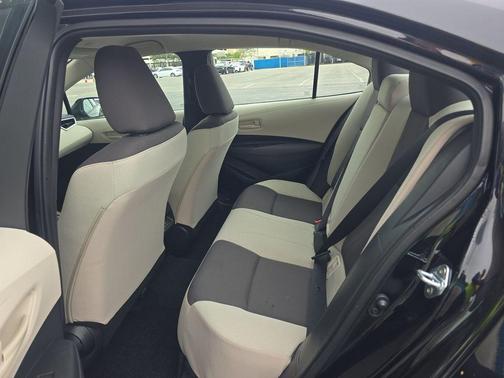 Midnight Black Metallic 2025 Toyota Corolla LE