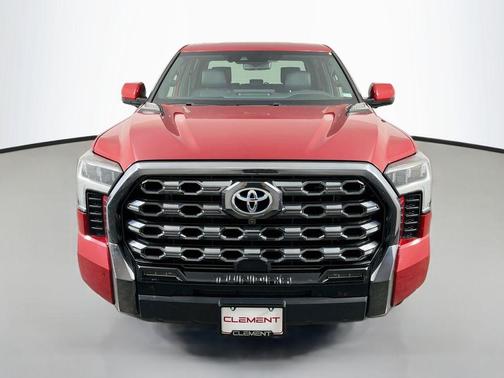 Red 2023 Toyota Tundra Hybrid Platinum