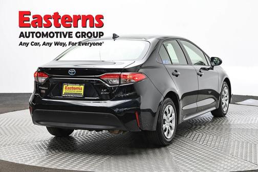 Midnight Black Metallic 2025 Toyota Corolla Hybrid SE