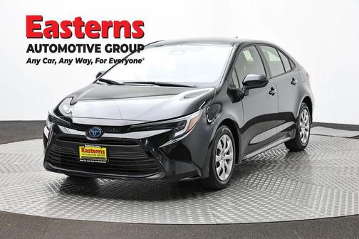 Midnight Black Metallic 2025 Toyota Corolla Hybrid SE