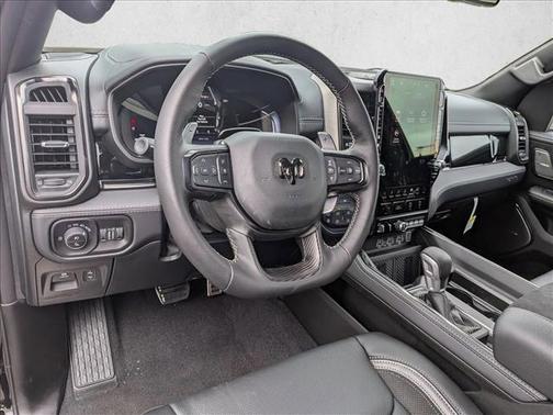 Diamond Black Crystal Pearlcoat 2026 RAM 1500 RHO Crew Cab 4x4 5'7' Box