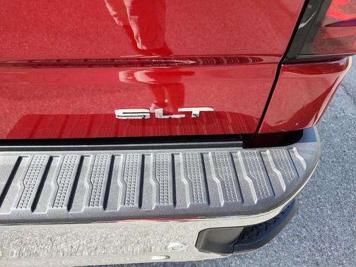 Volcanic Red Tintcoat 2026 GMC Sierra 1500 SLT