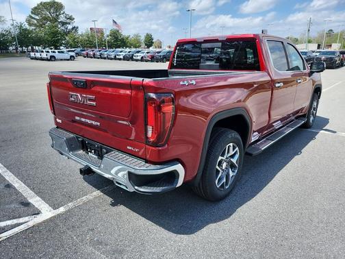 Volcanic Red Tintcoat 2026 GMC Sierra 1500 SLT