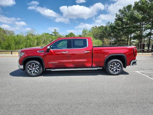 Volcanic Red Tintcoat 2026 GMC Sierra 1500 SLT