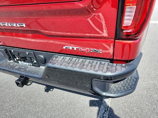 Volcanic Red Tintcoat 2026 GMC Sierra 1500 AT4X