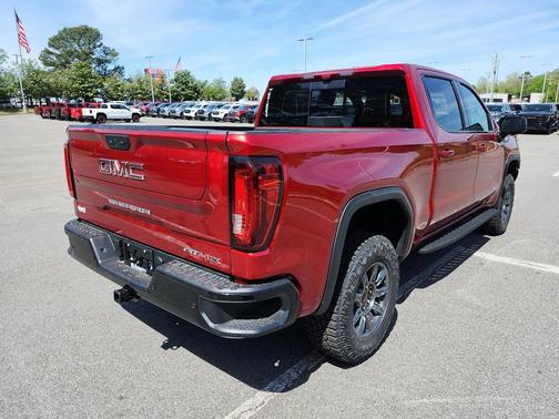 Volcanic Red Tintcoat 2026 GMC Sierra 1500 AT4X