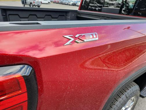 Volcanic Red Tintcoat 2026 GMC Sierra 1500 SLT