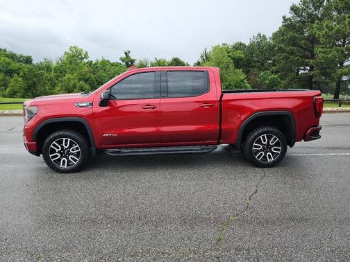 Volcanic Red Tintcoat 2024 GMC Sierra 1500 AT4