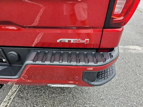 Volcanic Red Tintcoat 2024 GMC Sierra 1500 AT4