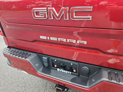Volcanic Red Tintcoat 2024 GMC Sierra 1500 AT4