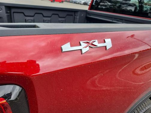 Volcanic Red Tintcoat 2026 GMC Sierra 1500 SLT