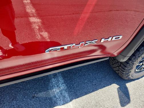 Volcanic Red Tintcoat 2026 GMC Sierra 2500 AT4X