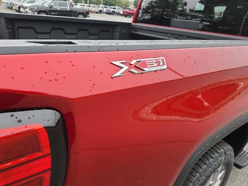 Volcanic Red Tintcoat 2026 GMC Sierra 1500 SLT