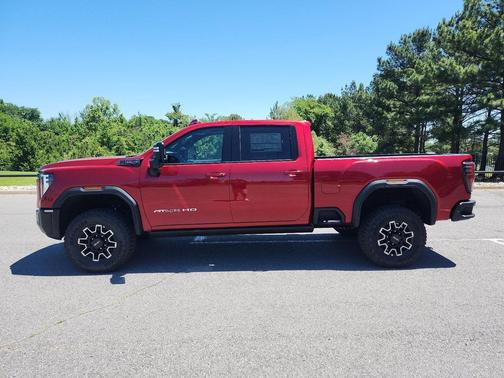 Volcanic Red Tintcoat 2026 GMC Sierra 2500 AT4X