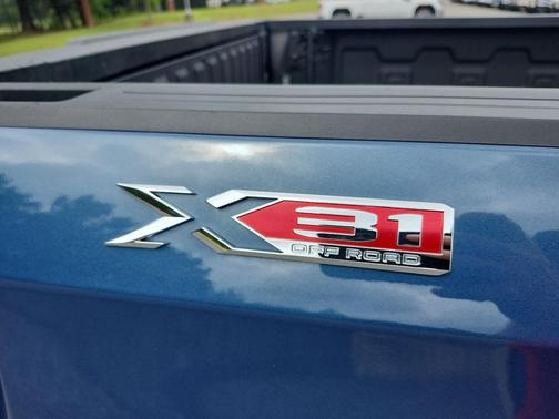 Downpour Metallic 2024 GMC Sierra 1500 SLT