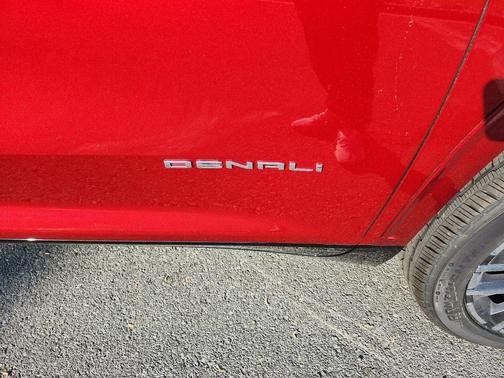 Volcanic Red Tintcoat 2026 GMC Acadia Denali