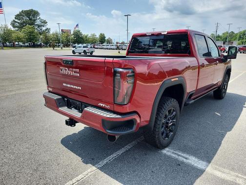 Volcanic Red Tintcoat 2026 GMC Sierra 3500 AT4