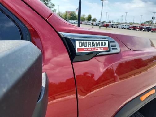 Volcanic Red Tintcoat 2026 GMC Sierra 3500 AT4