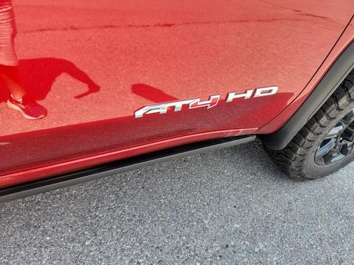 Volcanic Red Tintcoat 2026 GMC Sierra 3500 AT4