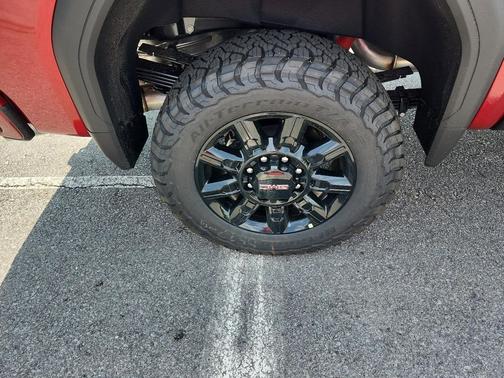 Volcanic Red Tintcoat 2026 GMC Sierra 3500 AT4
