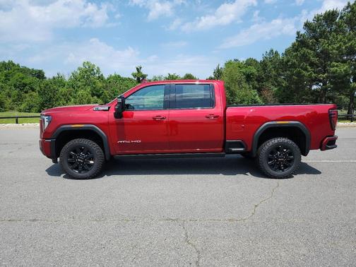 Volcanic Red Tintcoat 2026 GMC Sierra 3500 AT4