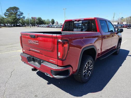 Volcanic Red Tintcoat 2026 GMC Sierra 1500 AT4