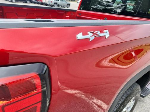 Volcanic Red Tintcoat 2024 GMC Sierra 1500 SLT